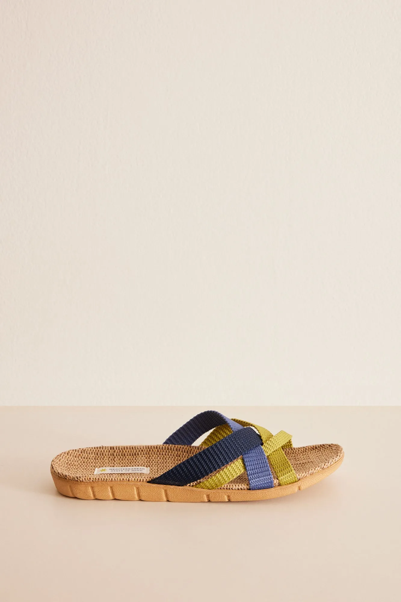 Open raffia sandal with intertwined straps