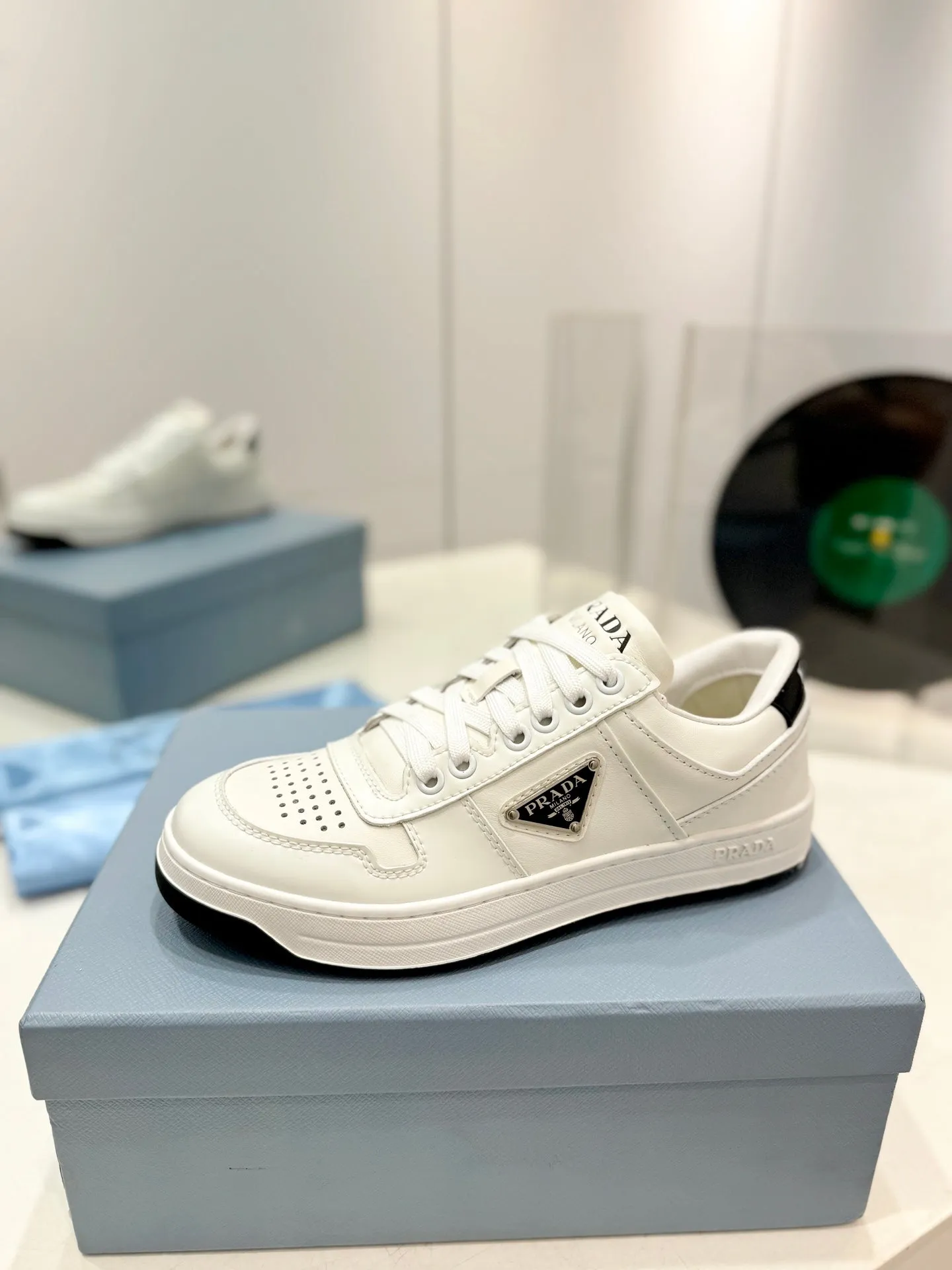 PRA DOWNTOWN PERFORATED SNEAKERS WHITE AND BLACK LOGO CALFSKIN