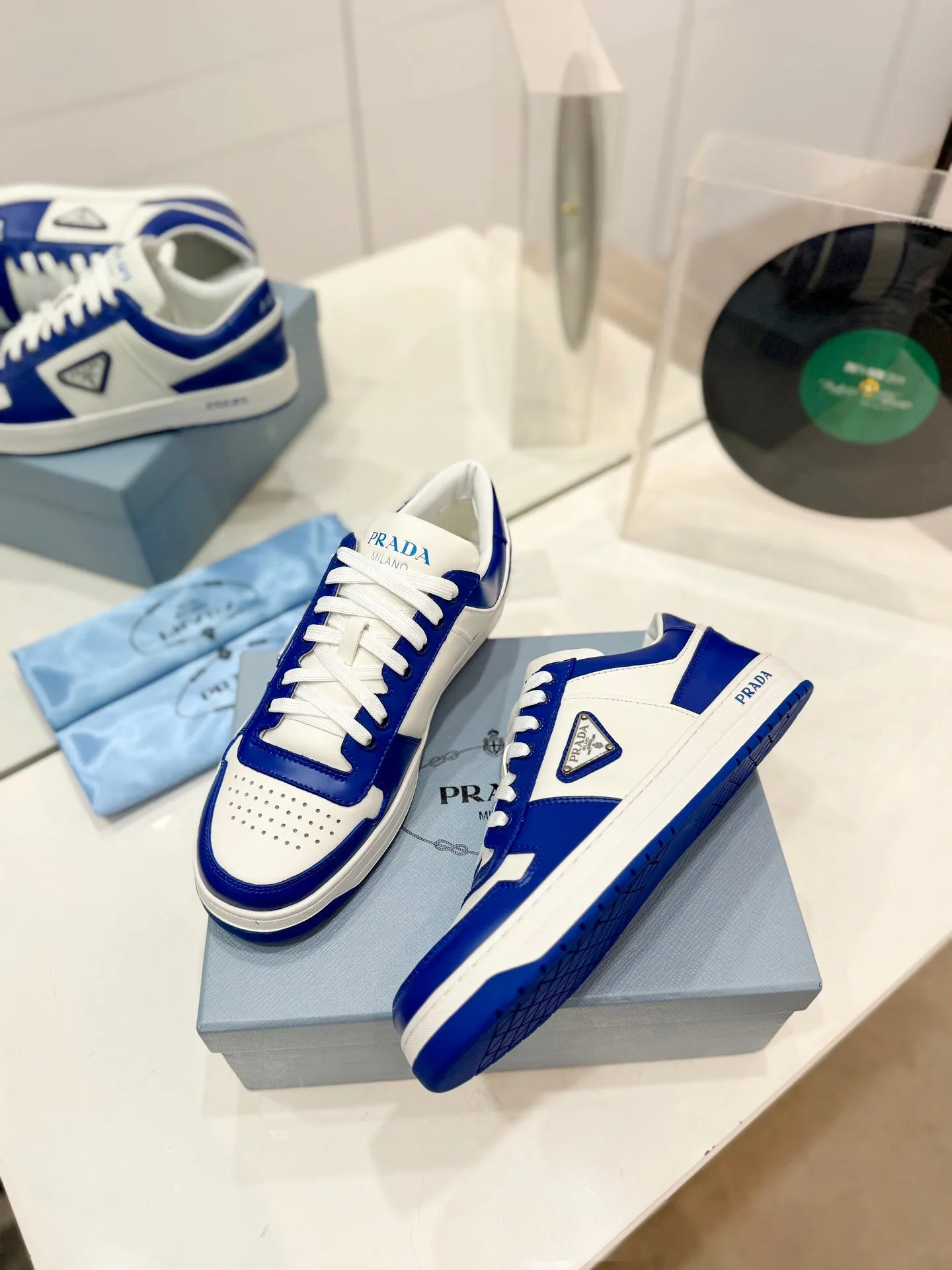 PRA DOWNTOWN PERFORATED SNEAKERS WHITE AND COBALT CALFSKIN