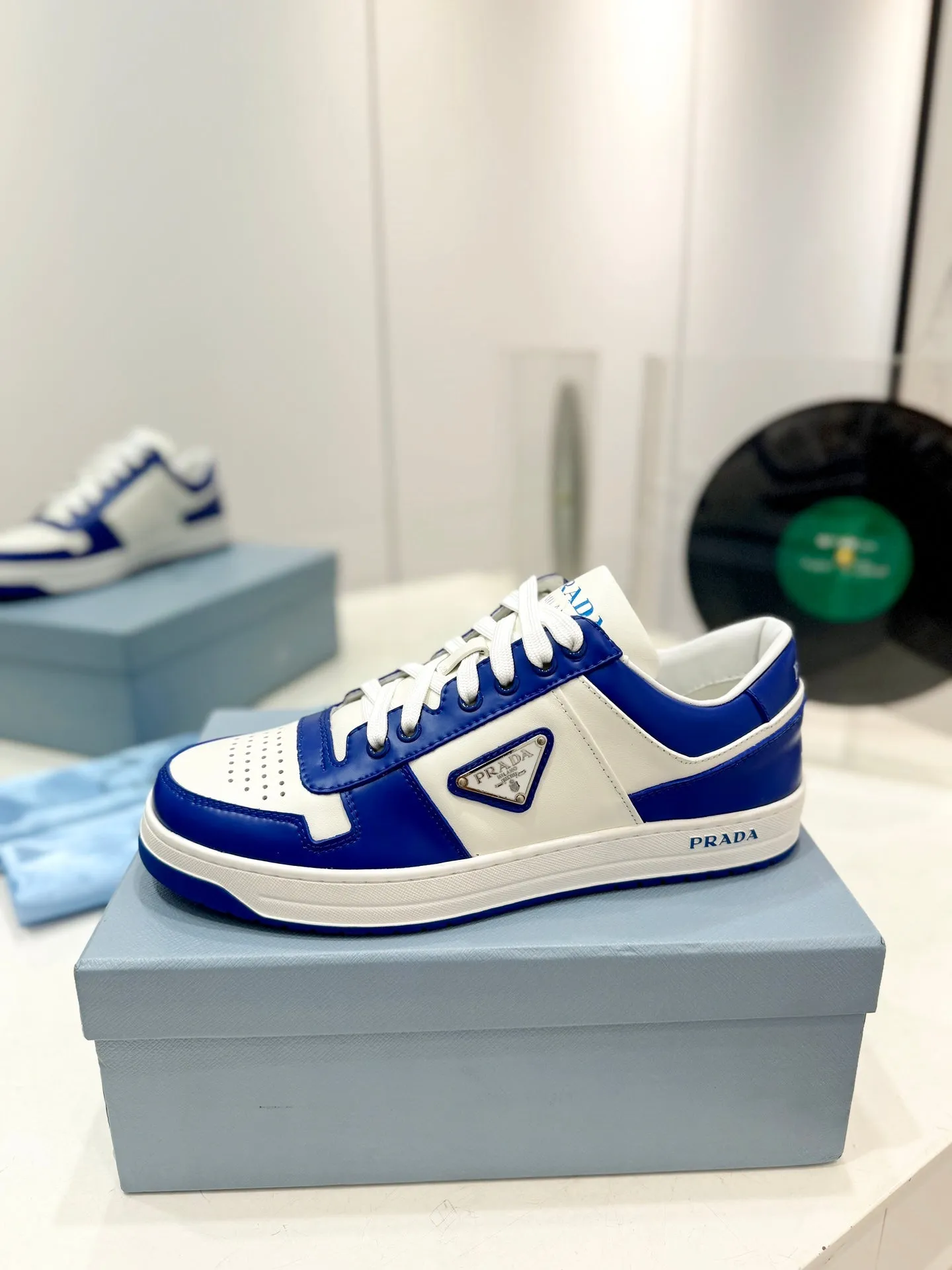 PRA DOWNTOWN PERFORATED SNEAKERS WHITE AND COBALT CALFSKIN