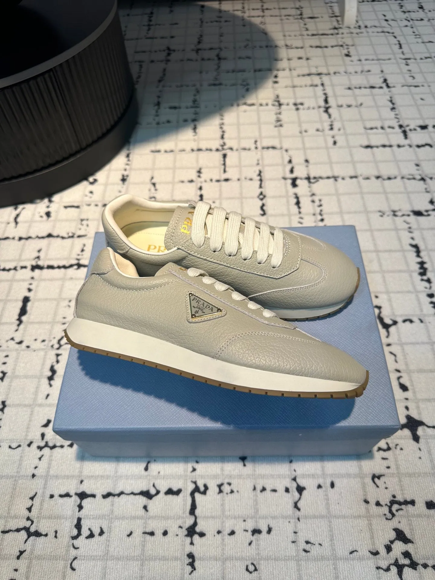 PRA TRIANGLE LOGO SNEAKERS LIGHT GRAY CALFSKIN