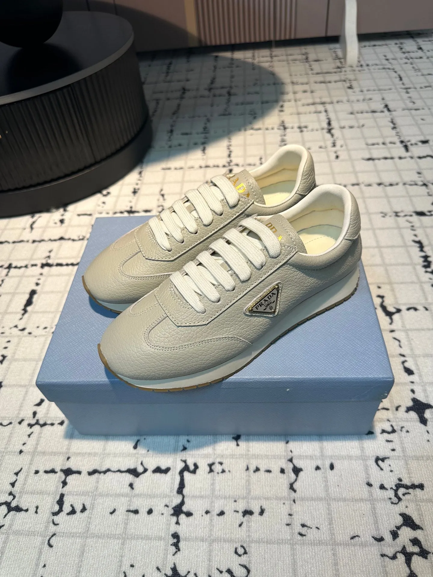 PRA TRIANGLE LOGO SNEAKERS LIGHT GRAY CALFSKIN