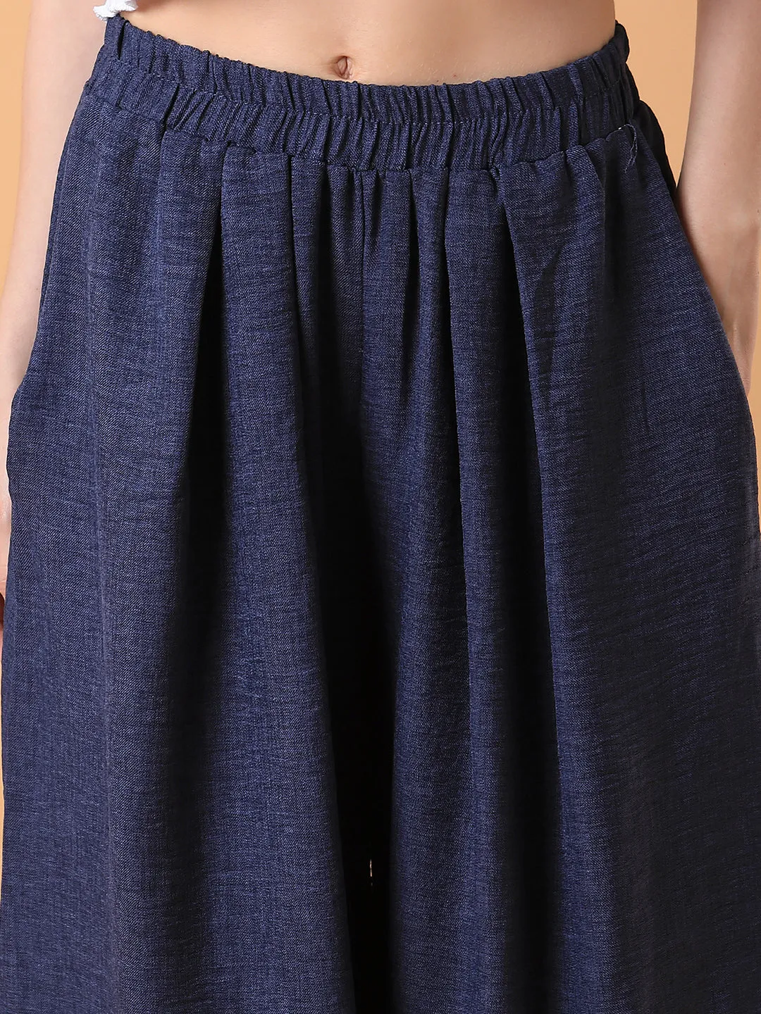 Women Solid Navy Blue Pleated Loose Fit Trouser